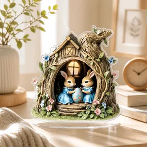 Detailed 2D acrylic Easter ornament featuring bunnies in a treehouse with festive eggs
