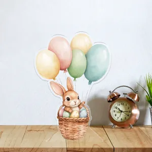 Macro view of 2D acrylic Easter bunny decoration with watercolor eggs and balloons