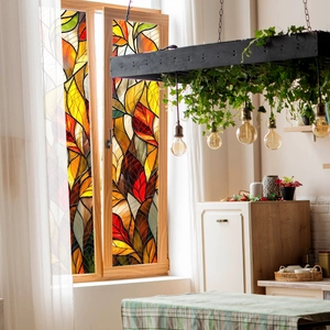 Artistic leaf pattern static window film with colorful frosted glass effect on wooden frame