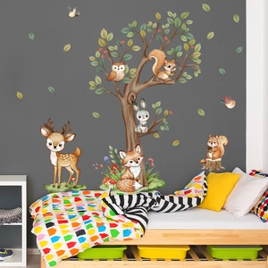 Detail of forest animal wall stickers with cartoon deer, fox, and tree on grey background