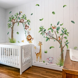 Detailed view of cartoon forest animal wall stickers in a cozy white nursery room