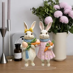 Flat 2D acrylic Easter bunny ornaments on transparent stands in home decor setting