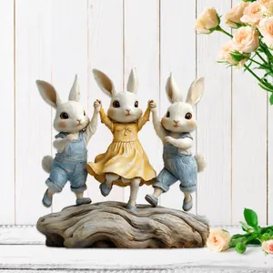 Detailed 2D acrylic Easter bunny ornament featuring three rabbits dancing on a wood log