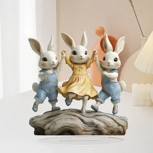 Detailed close-up of 2D flat acrylic Easter bunnies figurines on transparent base