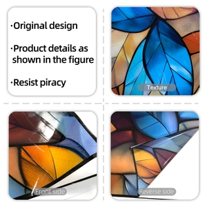 Detailed view of colorful leaf stained glass window film showing texture and both sides