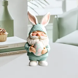 Detailed view of 2D acrylic Easter gnome standee with pastel egg on a clear oval base