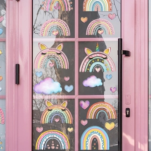 Rainbow and cloud static window clings applied on a glass door for home wall decoration