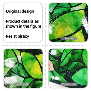 Macro detail of green leaf texture on stained glass window film with 3D embossed surface