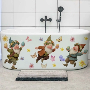 Detail of Easter gnomes with eggs and flowers wall stickers applied to a white bathtub