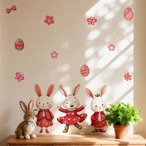Detailed view of Easter bunny wall decals with eggs and flowers on a warm nursery wall