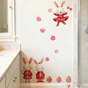 Detail of cute Easter bunny wall stickers with floral patterns on a bathroom wall