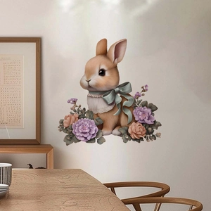 Detail of Easter bunny wall sticker with purple flowers on a minimalist beige wall