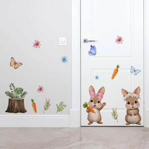 Watercolor Easter bunny wall stickers with floral and carrot details in a cozy room