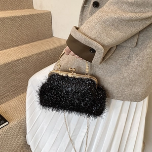 Vintage black plush clutch bag with gold floral handle and chain strap for women