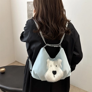 Light blue faux leather tote bag with cute plush puppy design for women casual style