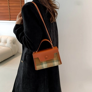 Retro plaid wool and brown leather crossbody bag with geometric flap and round buckle