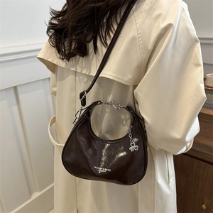 Women Korean Style PU Leather Crescent Shoulder Bag Retro Glossy Hobo Bag With Adjustable Strap Metal Clover Pendant Underarm Bag