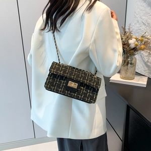 Elegante schwarze Tweed-Schultertasche mit goldener Kette und Metalldrehverschluss Damen
