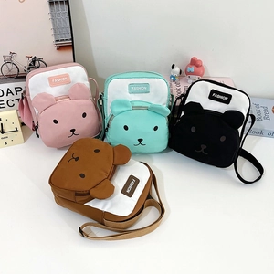 Cartoon crossbody bag with bear ears and fashion patch in pink green black brown colors