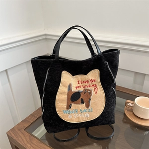 Black corduroy tote bag with cute cat embroidery and decorative side zippers