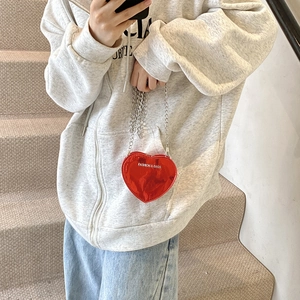 Chic red heart-shaped patent leather crossbody bag with silver chain and fashion text