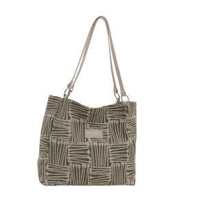 Large green striped canvas tote bag with leather handles and metallic ring detail