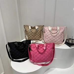 Quilted tote bags in four colors with adjustable straps for school and daily commute