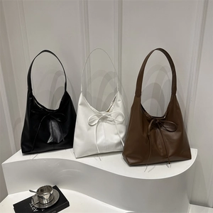 Large capacity vintage tote bag for women in black, white, and brown with bow detail