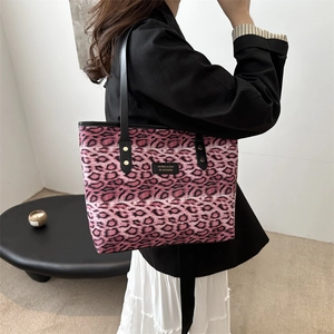 Large capacity pink leopard print tote bag with black straps and logo for women