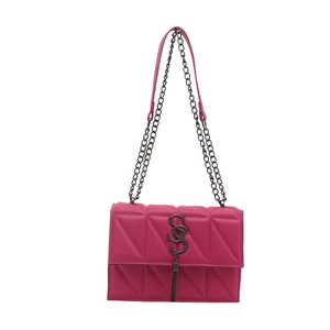 Fuchsia quilted leather crossbody bag with silver chain and fringe tassel detail