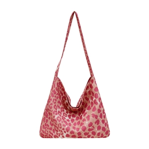 Chic pink leopard print canvas shoulder bag with wide strap for trendy daily commuting