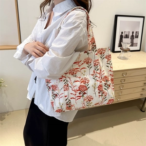 Large capacity floral canvas tote bag for women with shoulder straps and outer pocket