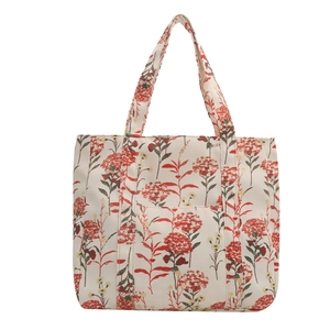 Floral canvas tote bag with red hydrangea patterns and front pocket on white background