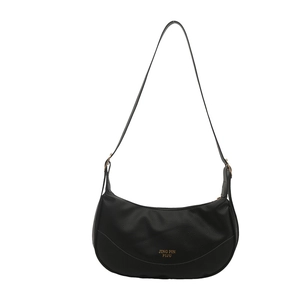 Retro black faux leather crescent shoulder bag with golden buckle and sleek design