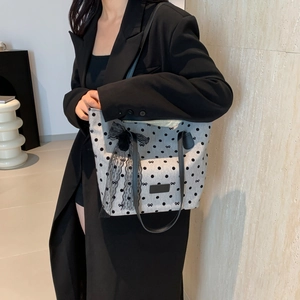 Chic grey polka dot tote bag with lace bow decoration and black leather shoulder straps