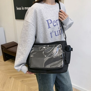Black canvas messenger bag with transparent PVC window and adjustable strap for students