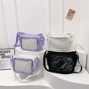 Trendy transparent nylon crossbody bags in purple, cream, and black on a white display