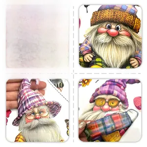Close-up of double-sided spring gnome window stickers with floral patterns and butterflies