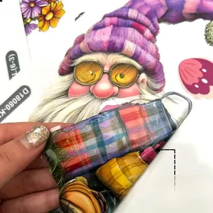 Spring gnome window cling detail with colorful flower patterns and transparent film texture