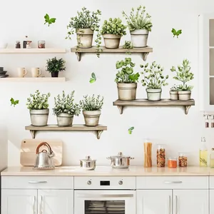 Detail of watercolor green plants and butterflies wall decals on a kitchen backsplash