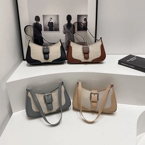 Sacs baguette minimalistes en toile et cuir, présentés en quatre couleurs élégantes