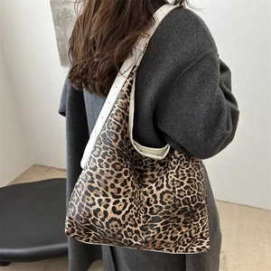 Stylish leopard print hobo bag with large capacity and white shoulder strap for women