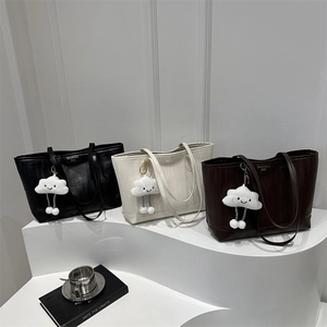 Three large capacity tote bags in black, beige, and brown with cloud charms