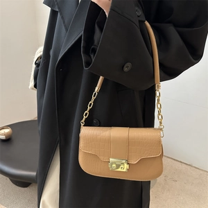 Chic khaki faux leather baguette bag with crocodile texture and gold chain strap