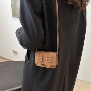 Mini square crossbody bag in khaki brown with crocodile pattern for minimalist chic styling