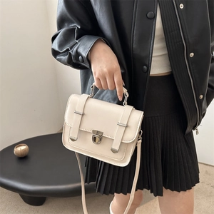 Chic retro cream-white small square handbag with silver metal buckle and top handle
