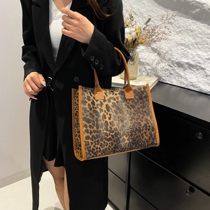 Large leopard print tote bag with brown handles, stylish women's shoulder bag for commuting