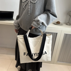Minimalist canvas bento tote bag with FANYISSA print and dual strap handles