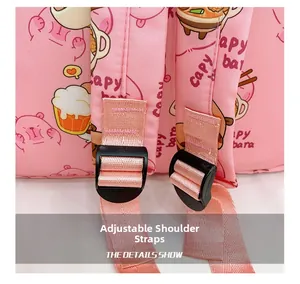 Detailed view of adjustable pink woven shoulder straps with black plastic buckles