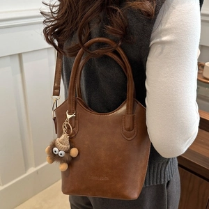 Women Retro PU Leather Bucket Bag With Monster Plush Pendant Vintage Aesthetic Handheld Crossbody Shoulder Bag Casual Daily